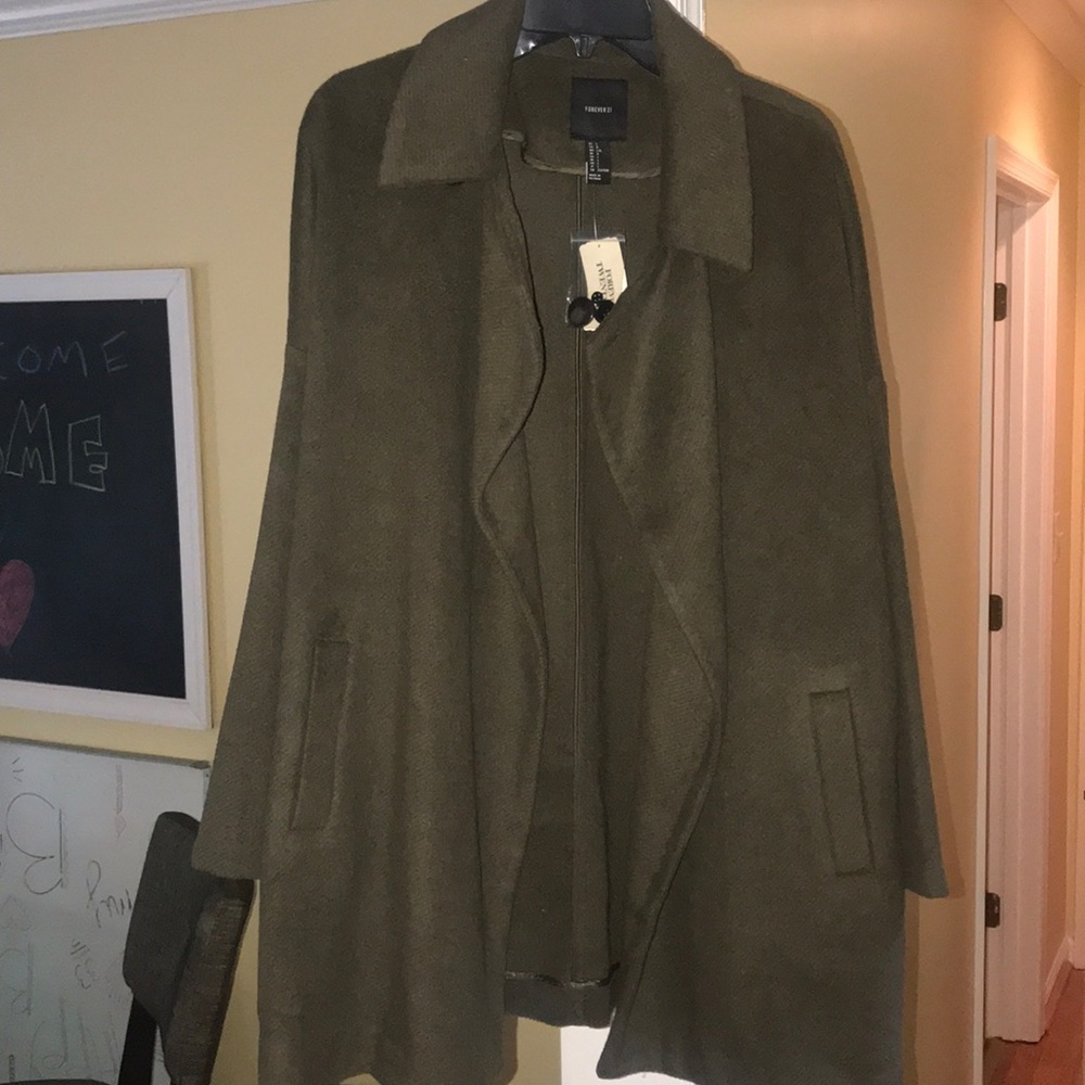 Brand never. Never worn. Olive green Size L